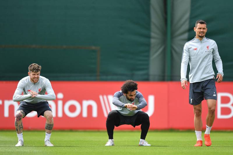 (L-R) Liverpool's Spanish defender Alberto Moreno, Mohamed Salah and Dejan Lovren. AFP
