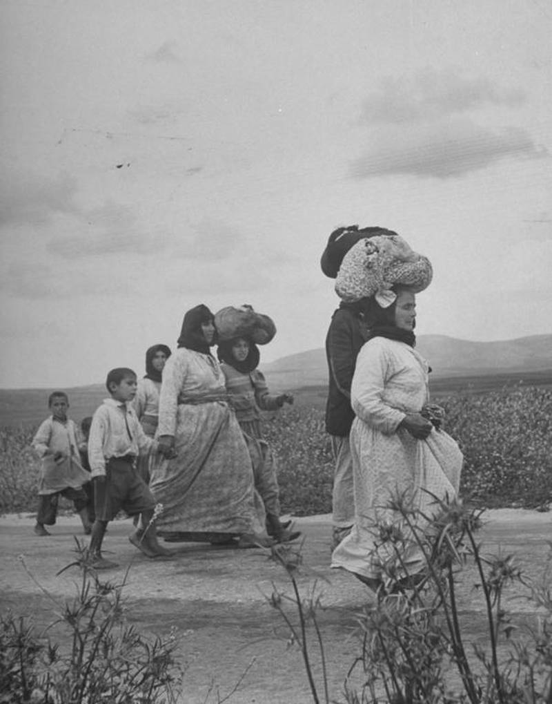 Women and children refugees evacuate the village of Zenin during the 1948 Palestinian Nakba. John Phillips / Time Life Pictures / Getty Images