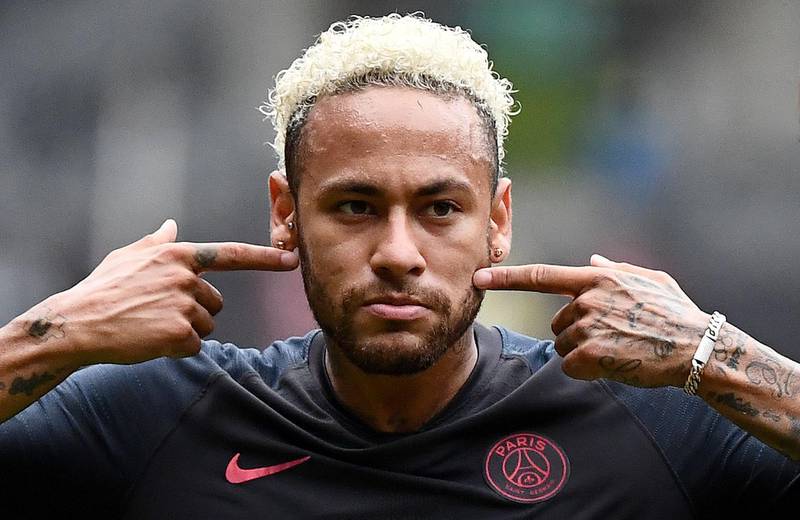 TOPSHOT - Paris Saint-Germain's Brazilian forward Neymar reacts at the end of the French Trophy of Champions football match between Paris Saint-Germain (PSG) and Rennes (SRFC) at the Shenzhen Universiade stadium on August 3, 2019. Representatives of FC Barcelona went on August 13, 2019 to France to discuss with those of Paris of a possible return to Barça of the Brazilian star Neymar without the file changing significantly. / AFP / FRANCK FIFE
