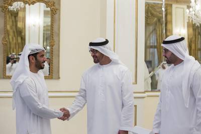 Sheikh Mohammed bin Zayed, Crown Prince of Abu Dhabi Deputy Supreme Commander of the Armed Forces, greet an employee from Miral, during a Sea Palace barza. Seen with Mohammed Al Mubarak, Chairman of Abu Dhabi Tourism and Culture Authority (R). Mohamed Al Hammadi / Crown Prince Court - Abu Dhabi
