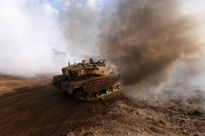 An Israeli tank takes part in an military exercise near Kibbutz Ortal in the Israel-annexed Golan Heights near the Lebanon border. AFP