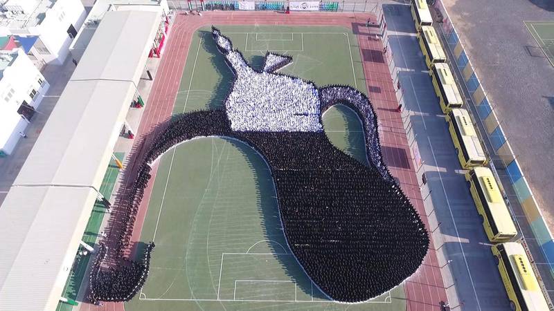  India International School in Sharjah got 5,500 students together to create a coffee pot. Courtesy Guinness World Records
