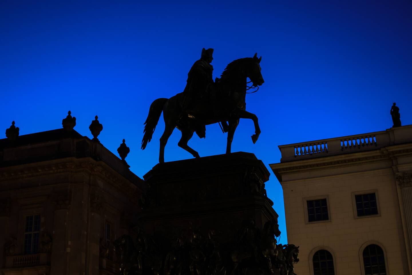 Berlin's Equestrian statue of Frederick the Great on Unter den Linden avenue with illumination turned off to save energy, on July 27. Getty