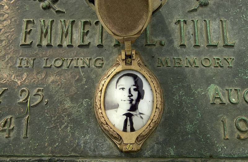 Emmett Till's photo is seen on his grave marker in Alsip, Illinois. AP