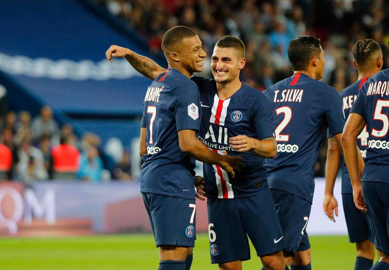 PSG's Kylian Mbappe, left, celebrates with his teammate Marco Verratti after scoring. AP Photo