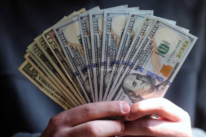 The Egyptian pound slid to about 18.50 to the US dollar on Tuesday from 18.27, a day after the country devalued its currency by 14 per cent, Refinitiv data showed. EPA
