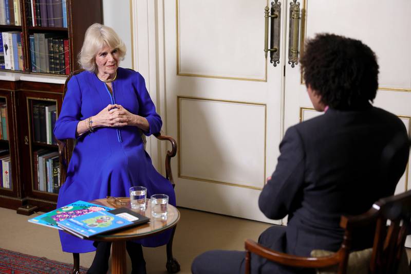 Queen Consort Camilla in conversation with Children's Laureate Joseph Coelho to mark World Book Day. PA / Getty