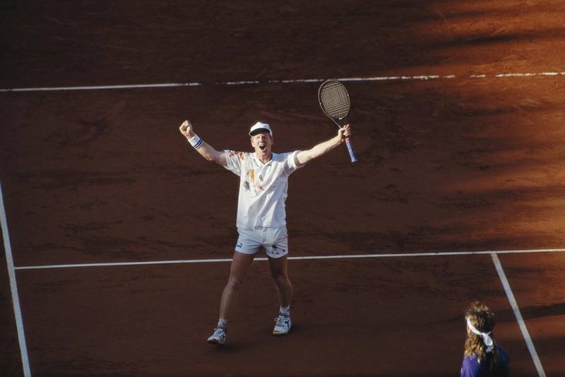 Jim Courier celebrates his defeat of Andre Agassi 3-6 6-4 2-6 6-1 6-4 in the final to win the Men's Singles title at the French Open on 9th June 1991at the Roland Garros stadium in Paris, France. (Photo by Pascal Rondeau/Getty Images)  