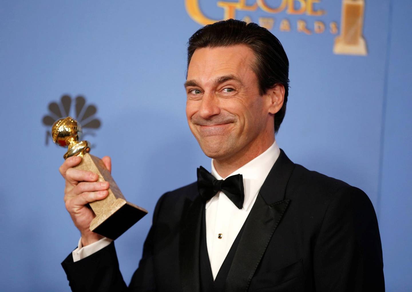 Jon Hamm poses backstage with his award for Best Performance by an Actor In A Television Series - Drama for his role in "Mad Men" at the 73rd Golden Globe Awards in Beverly Hills, California January 10, 2016.  REUTERS/Lucy Nicholson