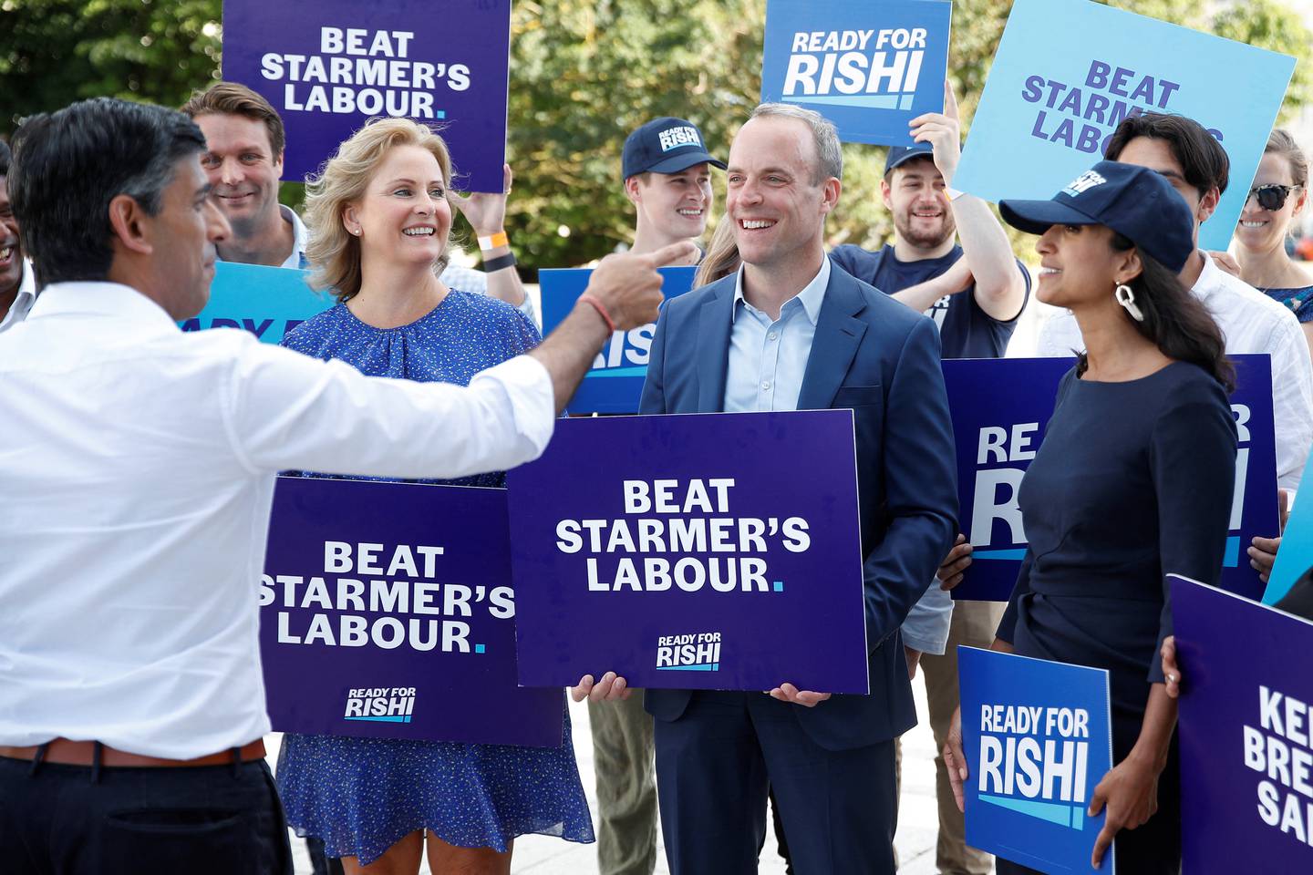 Dominic Raab, centre, campaigns with Rishi Sunak before a leadership hustings in Eastbourne. Reuters 
