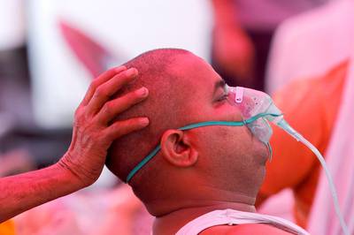 A man with a breathing problem receives oxygen support for free at a Gurudwara (Sikh temple), amidst the spread of coronavirus disease, in Ghaziabad, India. Reuters