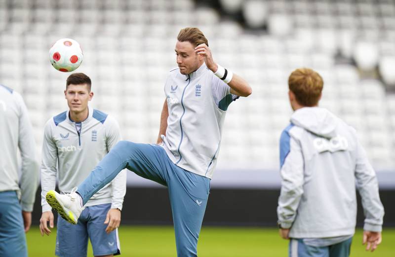 England's Stuart Broad kicks a ball during training. AP
