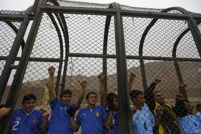 Prisoners participate in the opening ceremony of their own version of the 2014 World Cup at the Castro-Castro prison in Lima on Monday. Mariana Bazo / Reuters / June 2, 2014