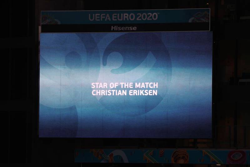 A video screen is dedicated to Denmark's Christian Eriksen after the match. PA