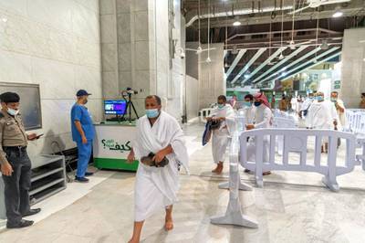 The first group of Muslims, allowed in the mosque compound by appointment, arrive at the Grand Mosque to perform Umrah. Courtesy General Presidency for the Affairs of the Grand Mosque and the Prophet's Mosque