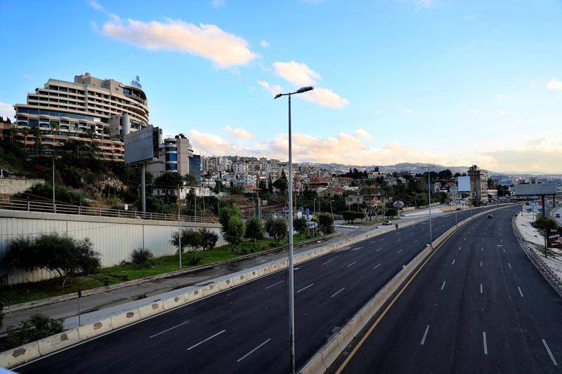 A major motorway linking the capital Beirut to northern Lebanon, is mostly empty of cars during a two-week lockdown to limit the spread of the coronavirus in Dbayeh, Lebanon. AP Photo