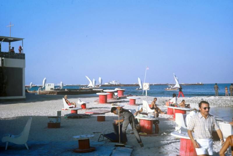 The main beach at The Club in the mid-1970s. Note the cable drums being used for tables. Photo: The Club