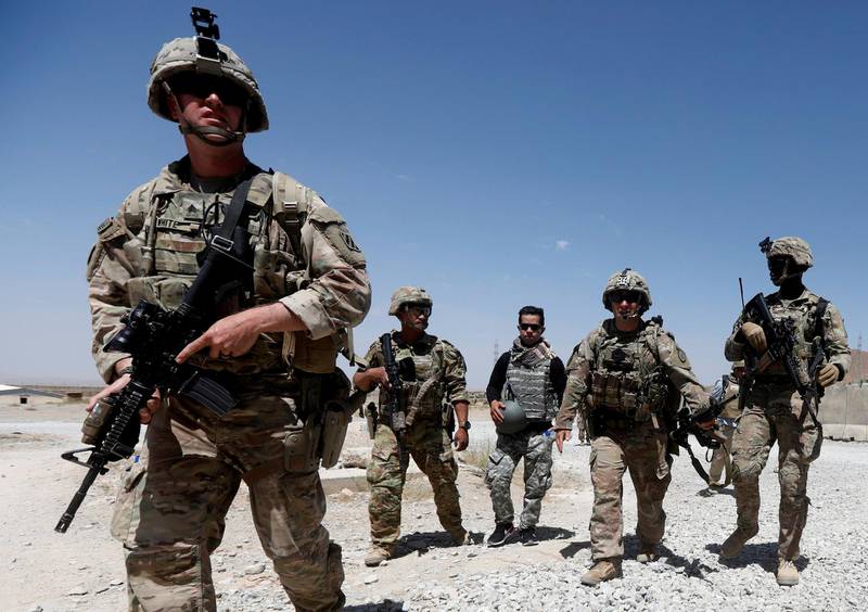 FILE PHOTO: U.S. troops patrol at an Afghan National Army (ANA) Base in Logar province, Afghanistan August 7, 2018. REUTERS/Omar Sobhani/File Photo