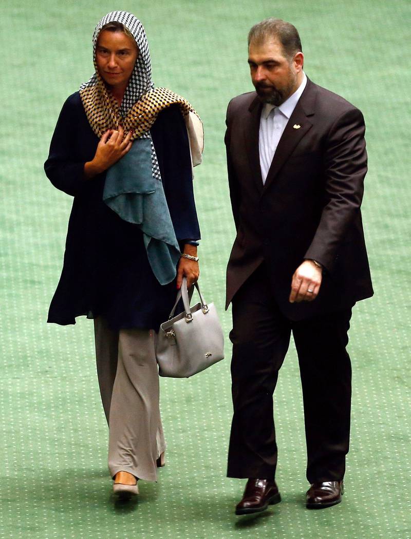 EU foreign policy chief Federica Mogherini, left, arrives to attend the Iranian parliament before Hassan Rouhani was sworn-in for his second four-year term of presidency at the parliament in Tehran, Iran. EPA