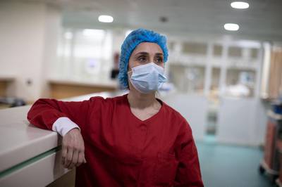 ©2021 Tom Nicholson. 12/01/2021. Beirut, Lebanon. Nurse Terese Ghoubar poses for a portrait in the Intensive Care Unit (ICU) at the Rafic Hariri University Hospital in southern Beirut, Lebanon. The country will go into a more severe lockdown on Thursday to curb a widespread increase in cases of COVID-19 Coronavirus. Photo credit : Tom Nicholson / The National