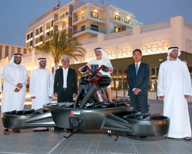 Saleh Mohamed Al Geziry, director general of Abu Dhabi's Department of Culture and Tourism, tries the Xturismo Hoverbike


