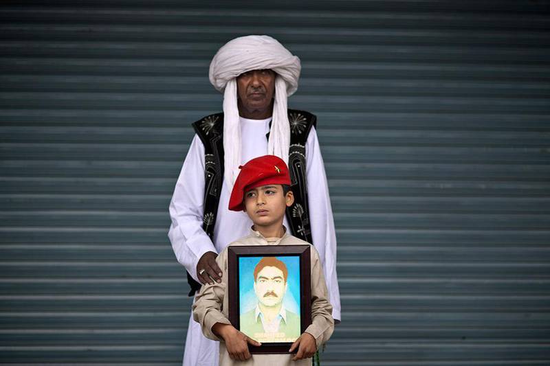 Mohammed Qadir, age 62, and his grandson Meer, age 7. Meer's father Jaleel went missing in 2010 and reported dead in 2013.
