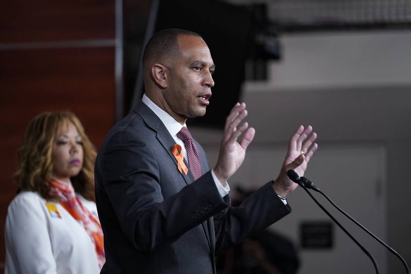 Democratic Caucus Chairman Hakeem Jeffries and Congresswoman Lucy McBath talk to reporters about Democratic efforts to curb gun violence. AP