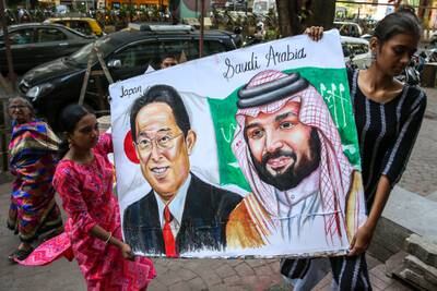 Students of Gurukul School of Art hold portraits of the Japanese prime minister and the Crown Prince of Saudi Arabia for the upcoming G20 summit, in Mumbai, India.  India is all set for the G20 summit scheduled for 09 and 10 September in New Delhi.   EPA
