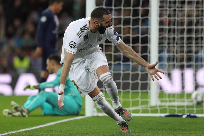 Real Madrid forward Karim Benzema celebrates after opening the scoring against PSG in their Champions League group game at the Bernabeu. EPA