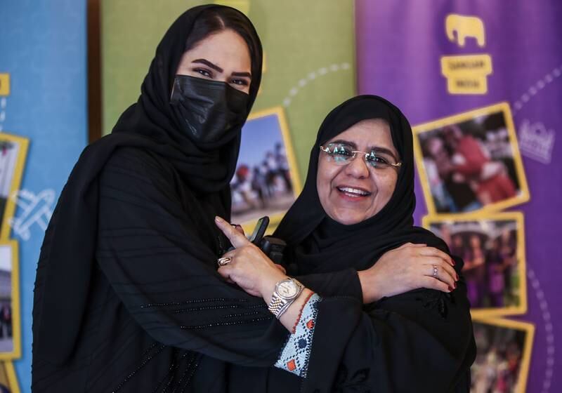 Sheikha Al Jaberi, right, a member of the Higher Committee, Girl Scouts UAE.