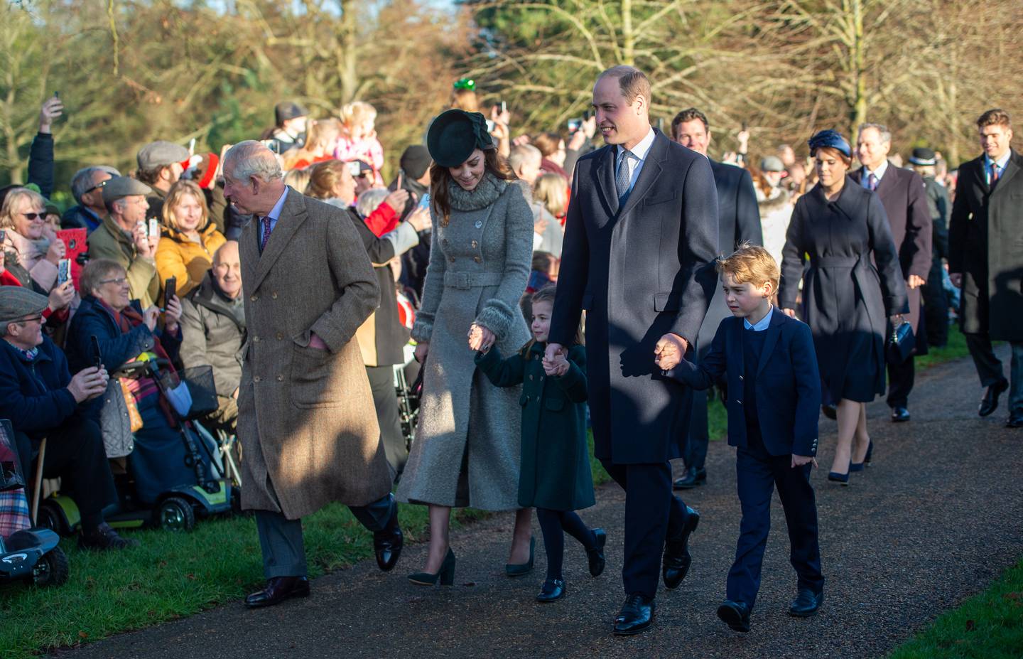 King Charles, the Duke and Duchess of Cambridge and their children arriving for the Christmas Day church service in Sandringham, in 2019.