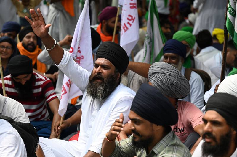 Farmers from various organisations gather as they participate in a protest against the central government policies, in New Delhi.