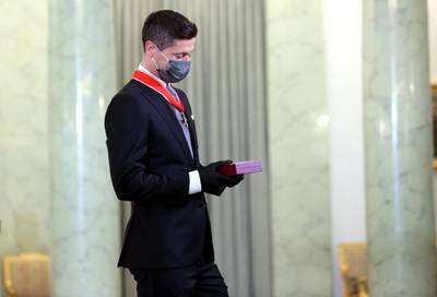 Bayern Munich's Polish striker Robert Lewandowski during the award ceremony of the Commander's Cross of the Order of Polonia Restituta at the Presidential Palace in Warsaw on Monday, March 22, 2021. EPA