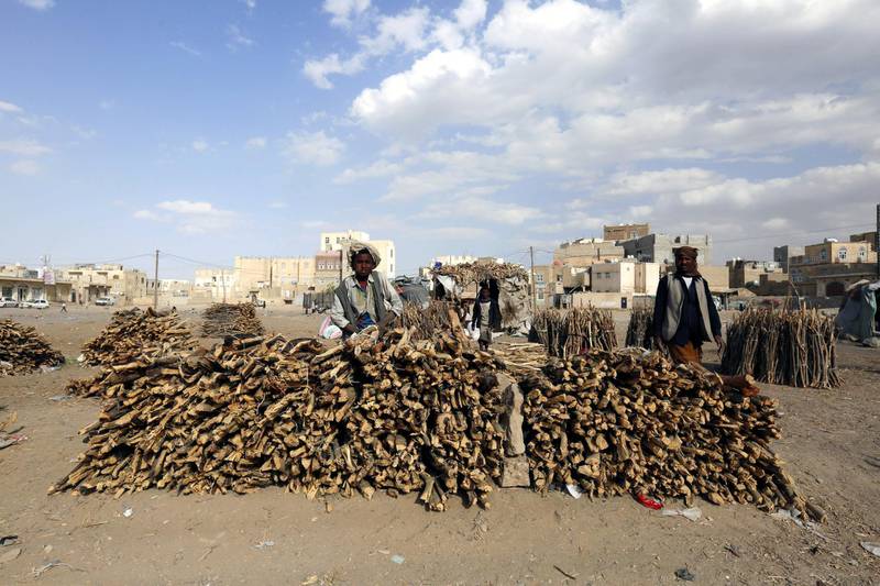 epa06579409 Yemeni vendors display firewood for sale amid an ongoing cooking gas shortage in Sana'a, Yemen. Yahya Arhab / EPA