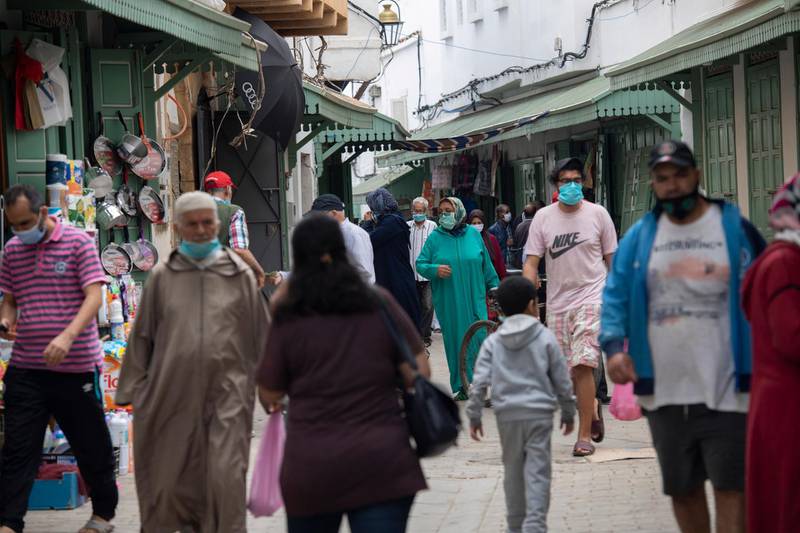 Citizens on bougroun Street wear mandatory face masks to prevent the spread of the coronavirus, in Rabat, Morocco. Morocco decided to gradually reduce the closing procedures and extended the public health emergency until July 10, according to a joint statement from the Ministry of Health and Ministry of Interior.  EPA