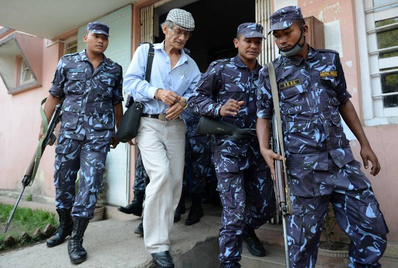 French serial killer Charles Sobhraj with Nepalese police after a court hearing in 2014. AFP