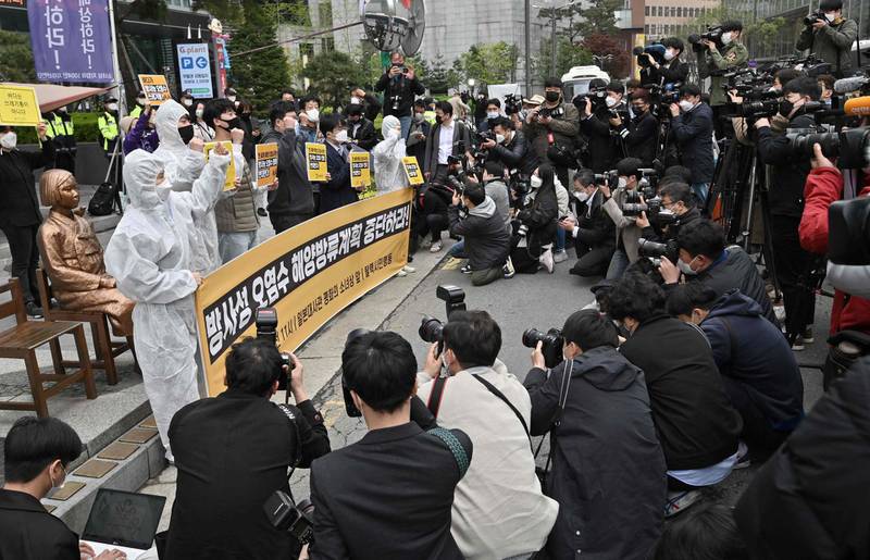 Environmental activists stage a protest near the Japanese embassy in Seoul, South Korea, against Tokyo’s decision to release waste water from the Fukushima nuclear plant into the Pacific Ocean. AFP