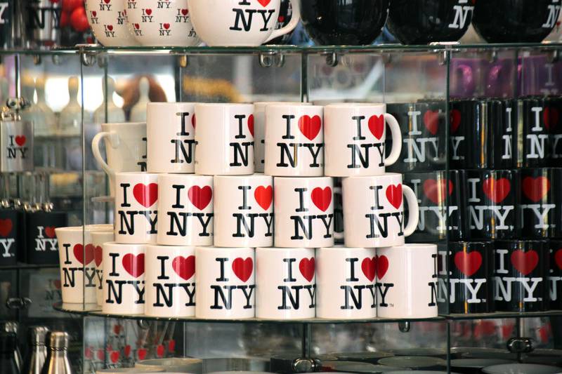 TDWMED New York, USA. 11th June, 2019. Cups with the "I love New York" logo are offered for sale in a souvenir shop. Hardly any logo in the world is so well known and has been copied so often. Inventor Milton Glaser got just $2000 for it, but the design laid the foundation for his steep career. Glaser turns 90 on 26.06.2019. (to dpa "inventor of the "I love New York" logo: US designer Glaser turns 90") Credit: Christina Horsten/dpa/Alamy Live News
