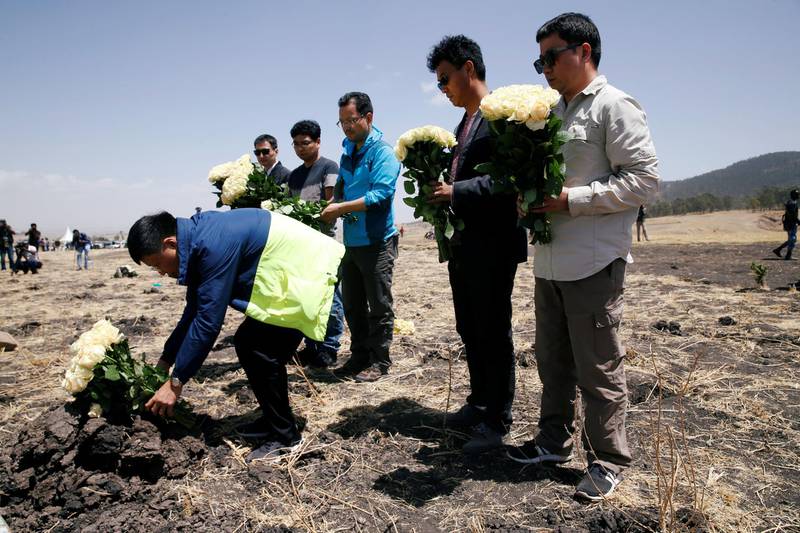 Chinese friends mourn a victim of the Ethiopian Airlines Flight ET 302 plane crash. Reuters