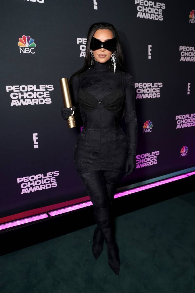 Kim Kardashian West, recipient of The Fashion Icon of 2021 award, poses backstage during the 2021 People's Choice Awards, held at Barker Hangar on December 7, 2021 in Santa Monica, California. Getty Images