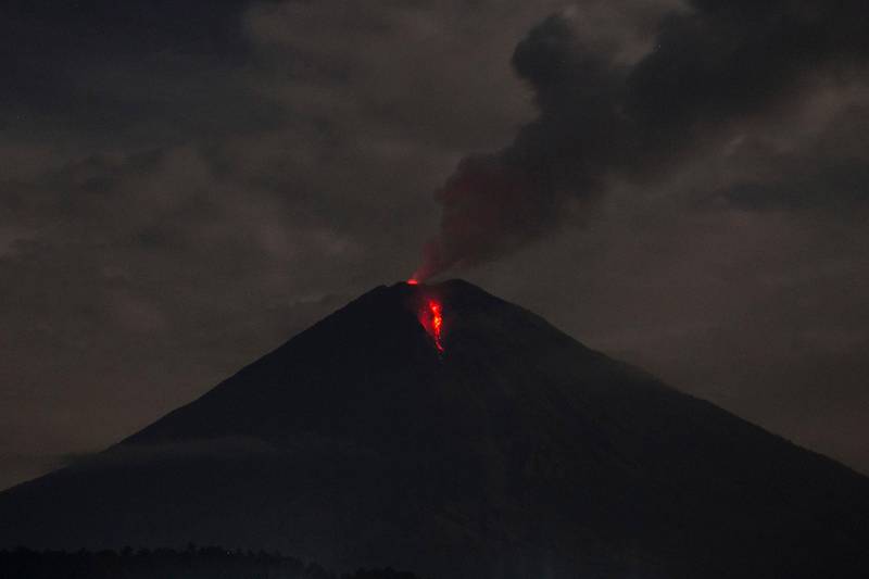 Lava streams down from Mount Semeru as seen from Lumajang, East Java, Indonesia.  EPA