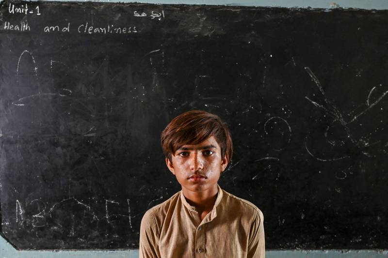 Nur Mohammad has taken refuge at a school after the rains in Jacobabad, Sindh Province. AFP