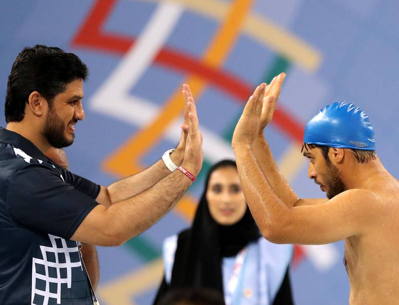 Dubai, United Arab Emirates - March 17, 2019: Abdulla Zubair Alshamsi of the UAE celebrates his win in the 50m Breaststroke during the swimming at the Special Olympics. Sunday the 17th of March 2019 Hamden Sports Complex, Dubai. Chris Whiteoak / The National