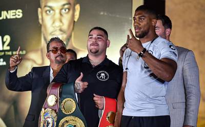 Andy Ruiz Jr and Anthony Joshua square off during the "Clash on the Dunes" press conference. AFP