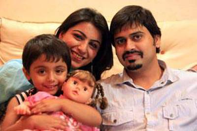 A family photo shows Munazza and Aqeel Malik with their daughter, Imanae, 3, who died after a lethal injection at a Lahore hospital.