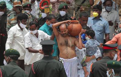 B Upender performs the final rites of his son Col Santosh Babu in Suryapet. AP Photo