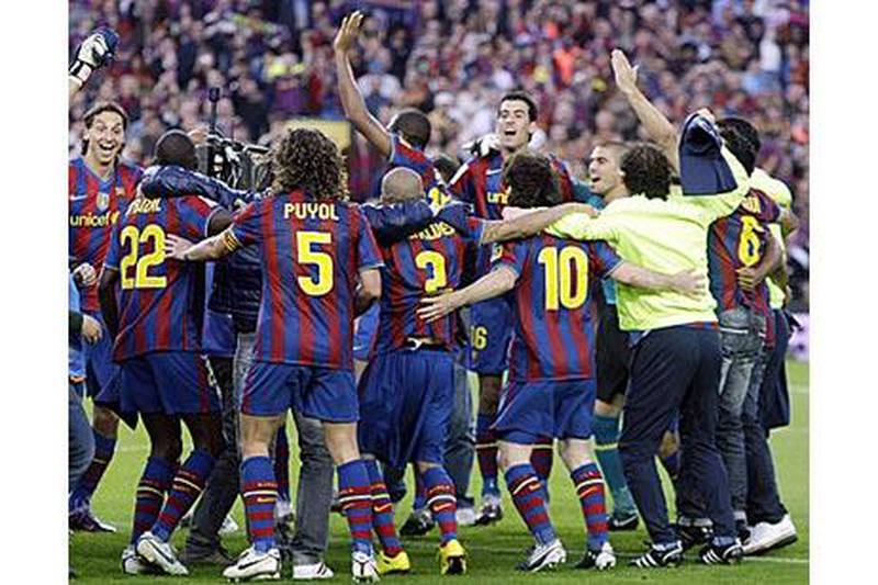 Barcelona celebrate winning the Spanish league title after victory over Valladolid.