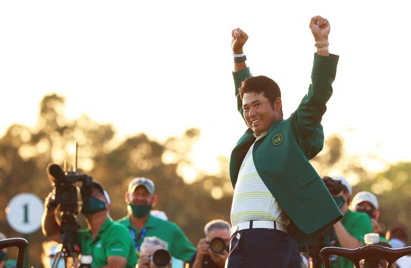 Hideki Matsuyama of Japan celebrates during the Green Jacket Ceremony after winning the Masters at Augusta National Golf Club. AFP