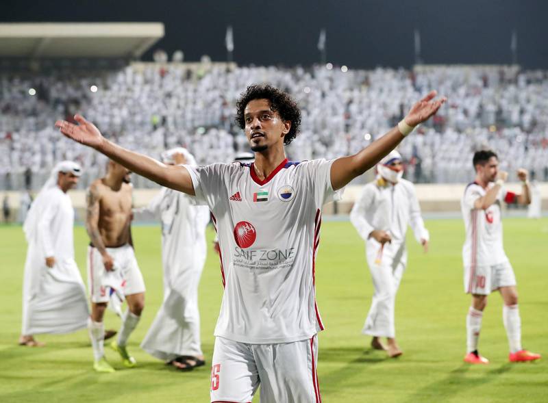 Sharjah, United Arab Emirates - May 15, 2019: Football. Sharjah's Mohamed Alshehhi celebrates winning the league after the game between Sharjah and Al Wahda in the Arabian Gulf League. Wednesday the 15th of May 2019. Sharjah Football club, Sharjah. Chris Whiteoak / The National