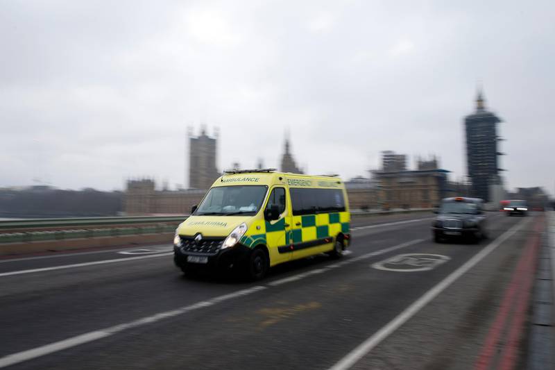 An ambulance crosses Westminster Bridge in London. Patient demand for the London Ambulance Service is "now arguably greater" than during the first wave. Getty Images